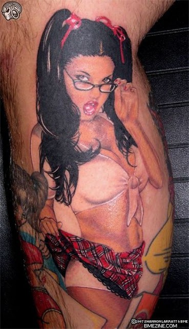 Seductive pin up brunette school girl in glasses colored tattoo on calf in realism style