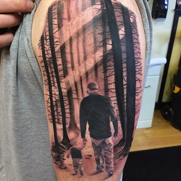 Sentimental father walking with his baby son in forest 3D realistic tattoo on shoulder