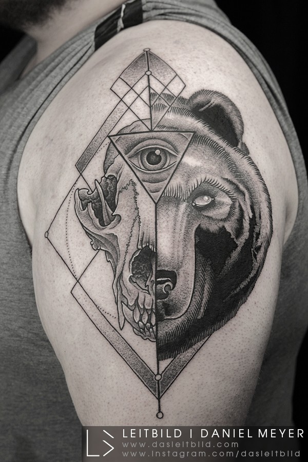 Separated black ink dot style shoulder tattoo of animal skull with bears head