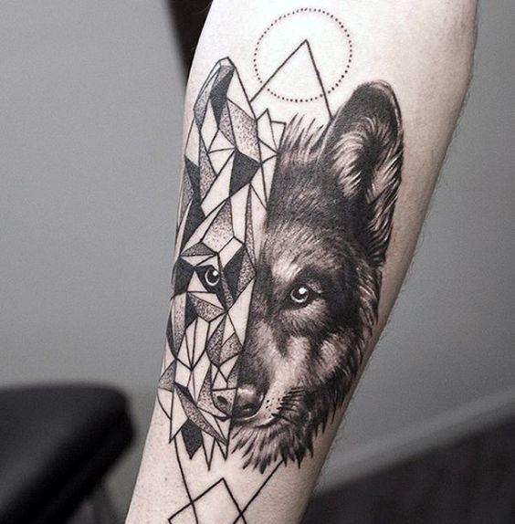 Separated black ink forearm tattoo of half geometrical half realistic wolf