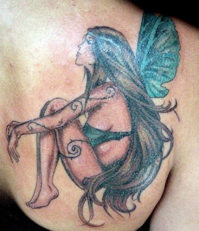 Sexy fairy tattoo on shoulder blade