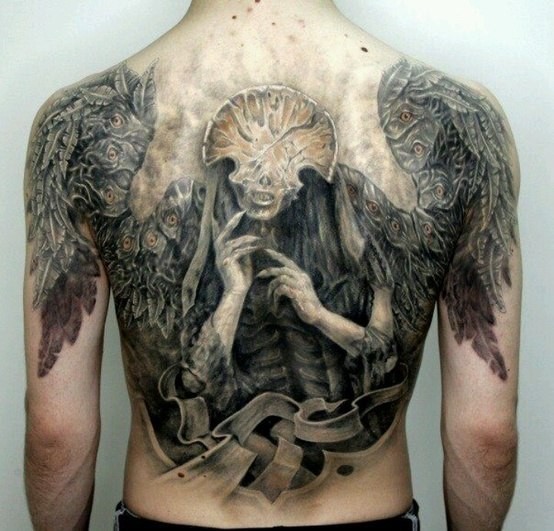 Shaman and wings tattoo on back