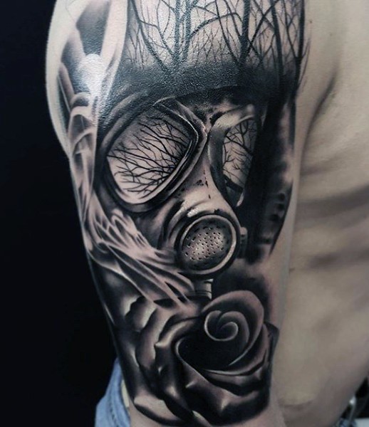 Sharp designed black ink realism style shoulder tattoo of gas mask and rose flower