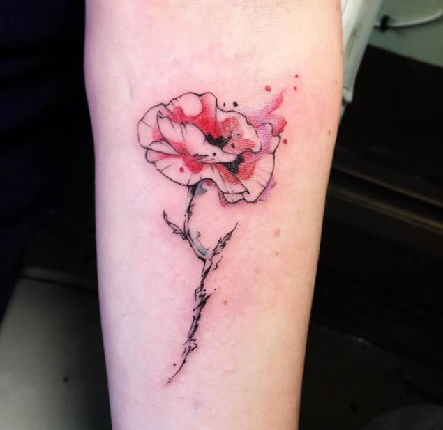 Simple abstract style half colored flower tattoo on forearm