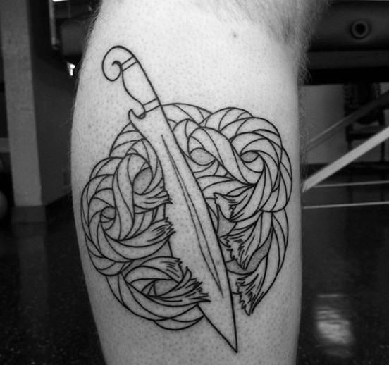 Simple black and white knife and rope tattoo on leg
