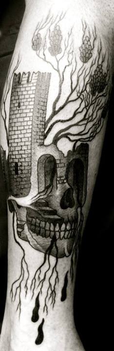 Simple black ink leg tattoo of skull stylized with castle and tree