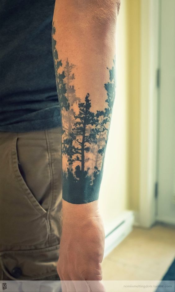 Simple black ink mystical dark forest forearm tattoo