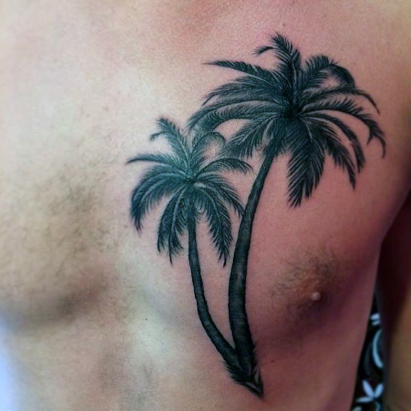 Simple black ink palm trees tattoo on chest