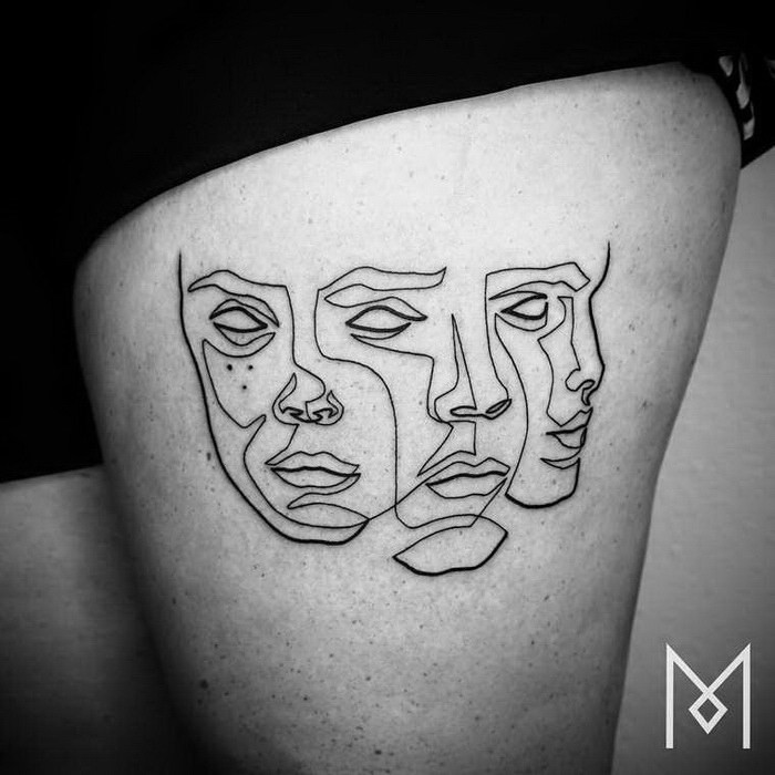 Simple black ink thigh tattoo of various masks