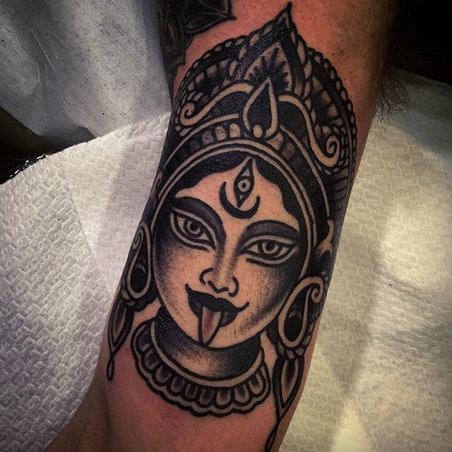Simple blackwork style tattoo of Hinduism Goddess