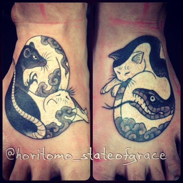 Simple cartoon style foot tattoo of cat with snake and rat