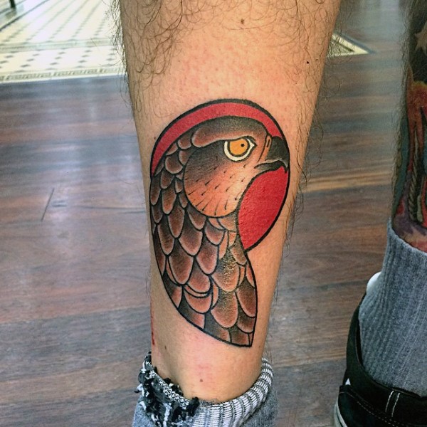 Simple colored old school eagle head tattoo on ankle