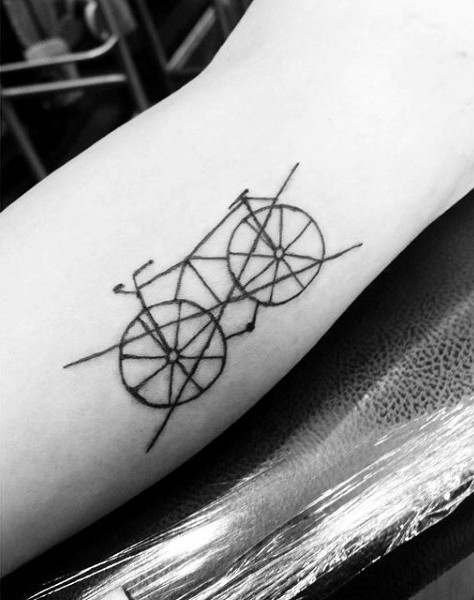 Simple design black ink strike through cycle tattoo
