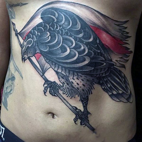 Simple designed and colored big eagle with flag tattoo on chest