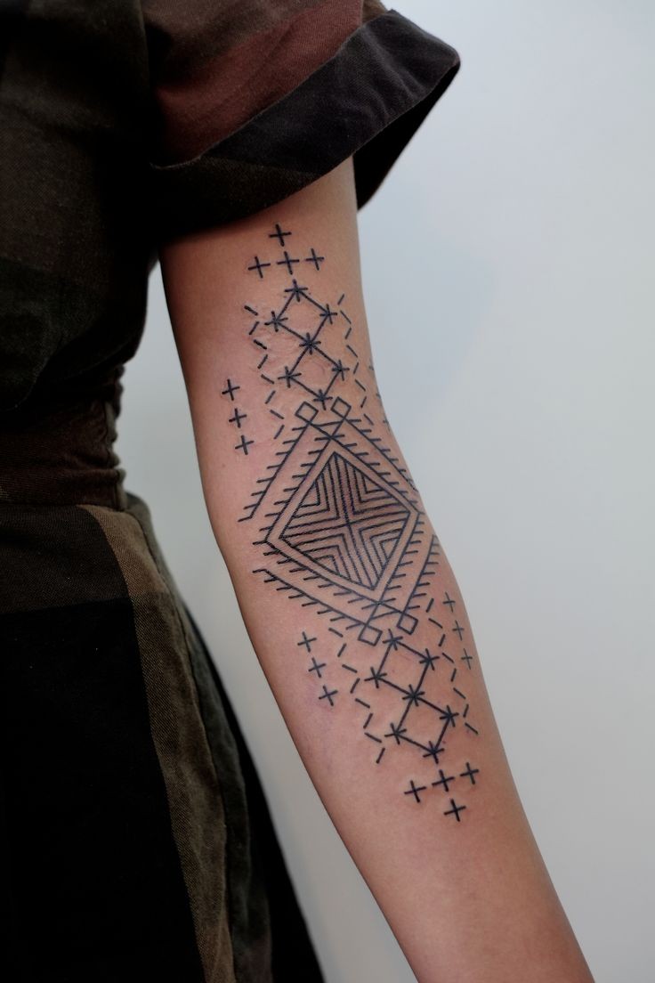 Simple designed big black ink tribal ornaments tattoo on arm