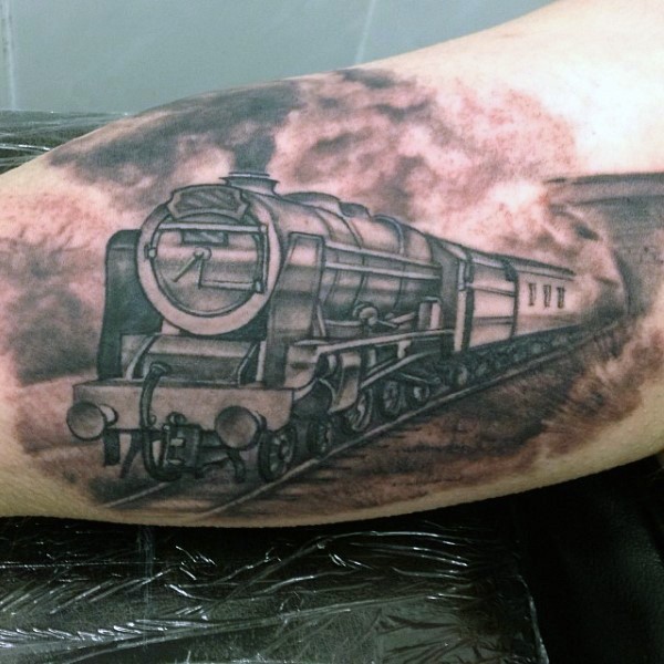 Simple designed black and white old train tattoo on arm