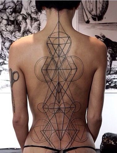 Simple designed black ink 3D geometrical tattoo on whole back