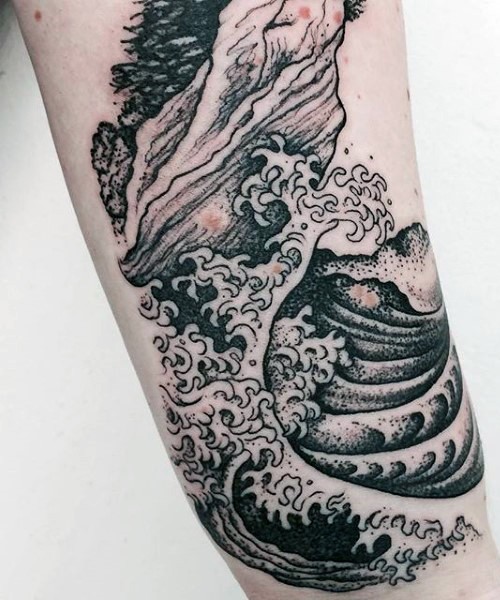 Simple designed black ink waves tattoo on arm