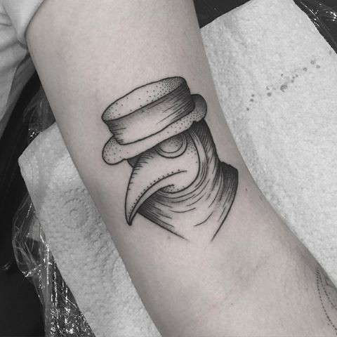 Simple dots style black ink plague doctor tattoo