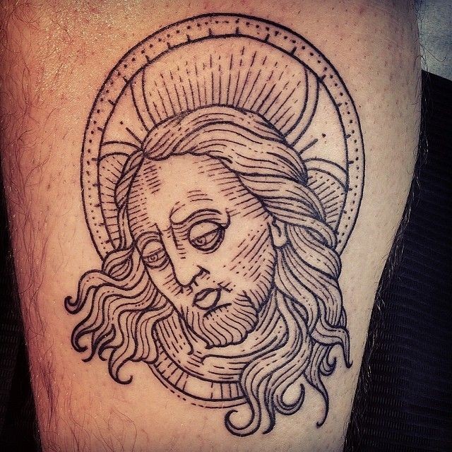 Einfaches hausgemachtes schwarzes Tattoo mit traurigem Jesus