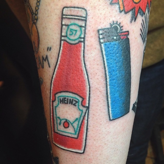 Simple homemade like colored ketchup bottle tattoo with lighter