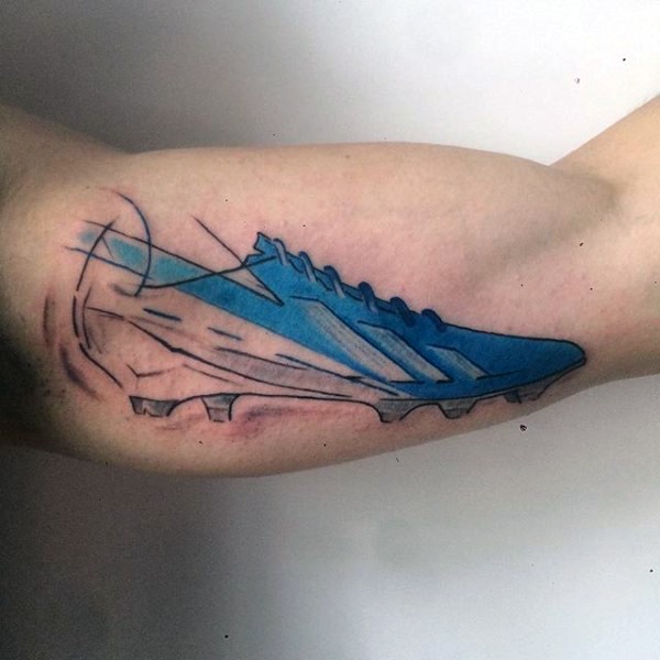 Simple homemade style biceps tattoo of sports shoes