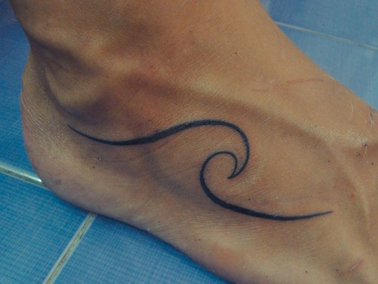 Simple ink wave foot tattoo