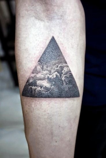 Simple little black and white triangle stylized with clouds tattoo on arm