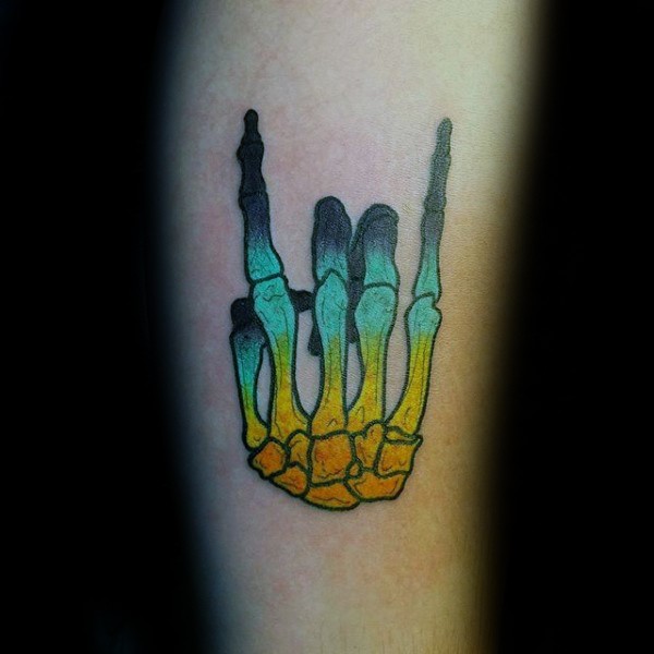 Simple old school style colored leg tattoo of human skeleton hand