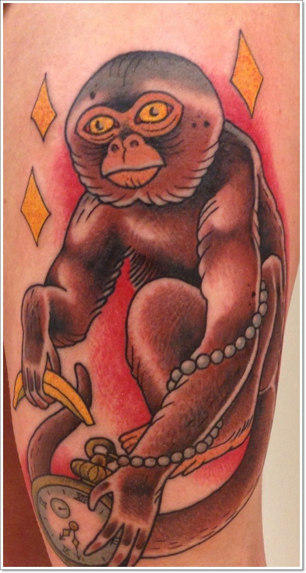 Simple old school style colored monkey with clock tattoo on thigh