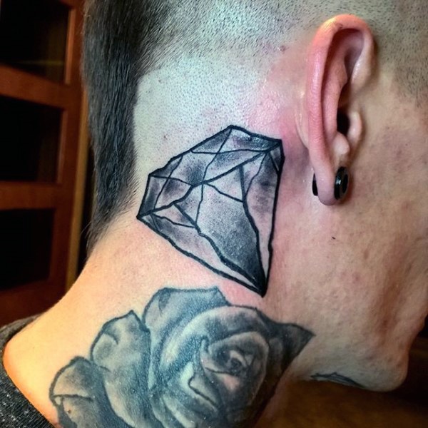 Simple painted black ink diamond tattoo on neck