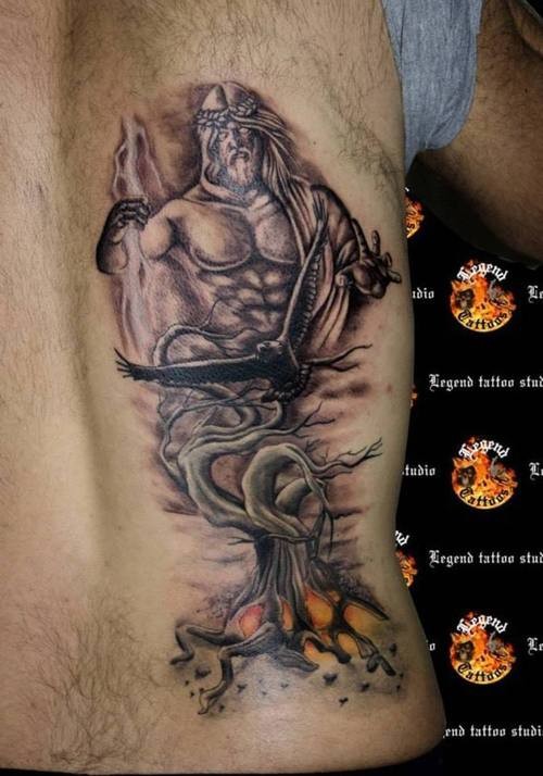 Simple painted colored Zeus tattoo on back stylized with tree and crow