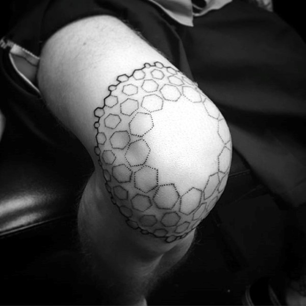 Simple stippling style black ink knee tattoo
