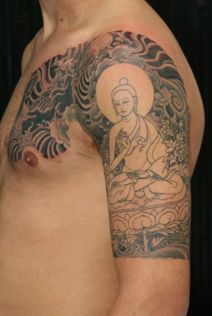 Sitting buddha tattoo on half sleeve