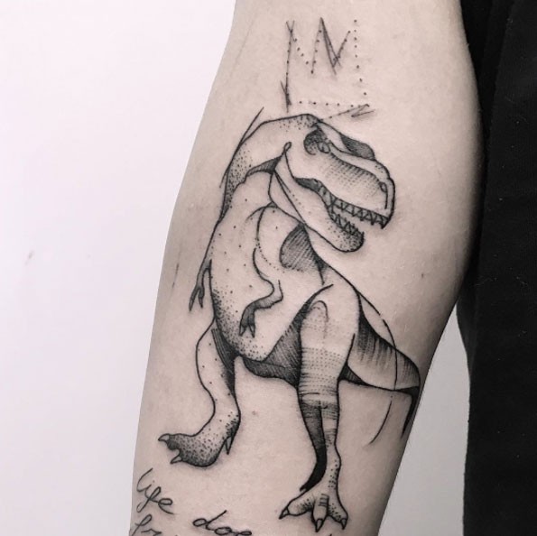 Sketch style black ink arm tattoo of dinosaur with crown