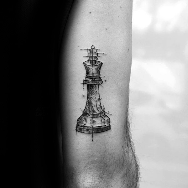 Sketch style black ink arm tattoo of medium size chess figure