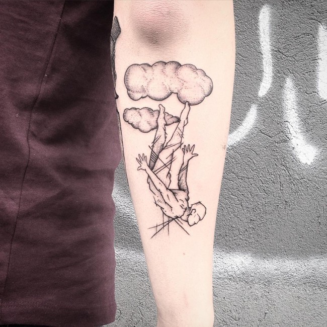 Sketch style black ink forearm tattoo of falling man from sky