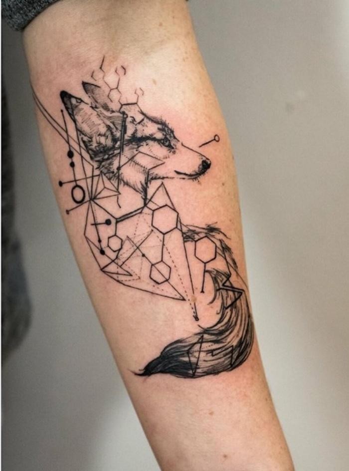 Sketch style black ink forearm tattoo with geometrical figures