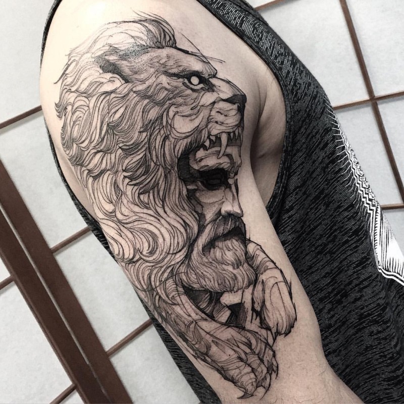 Sketch style black ink shoulder tattoo of mystical man with lion helmet