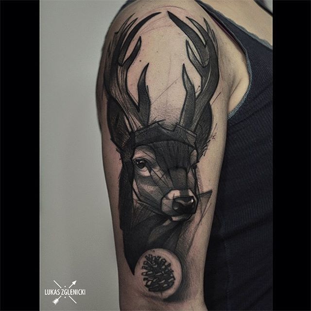 Sketch style black ink shoulder tattoo of deer head