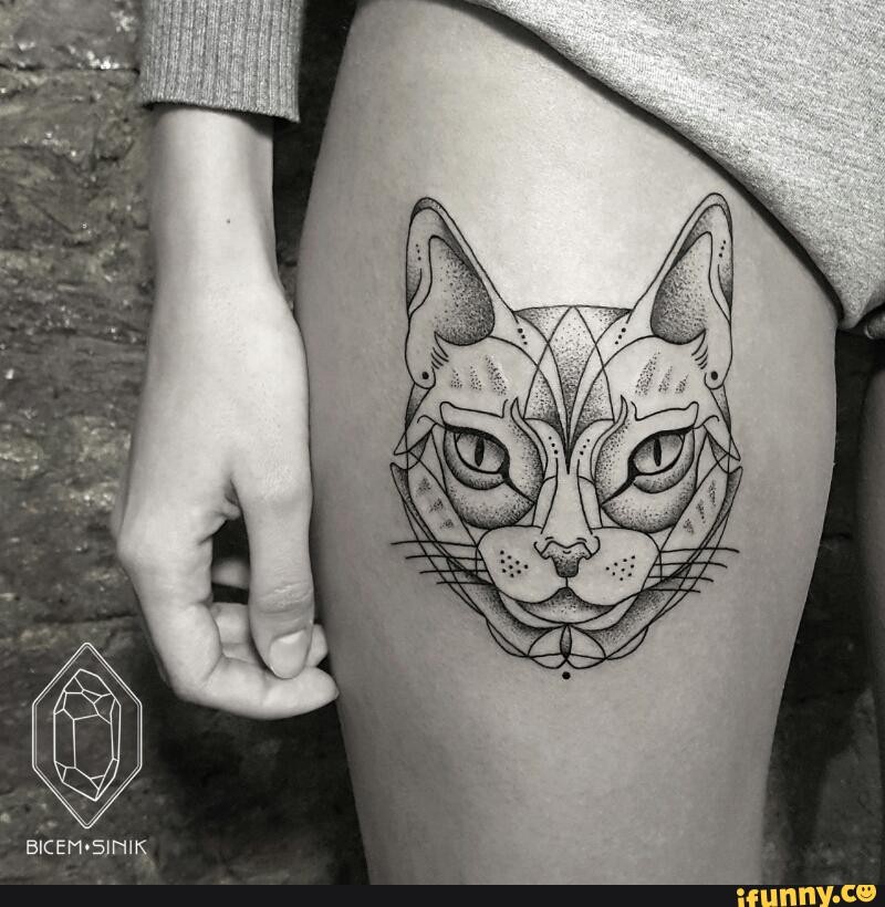 Sketch style black ink thigh tattoo of cat head