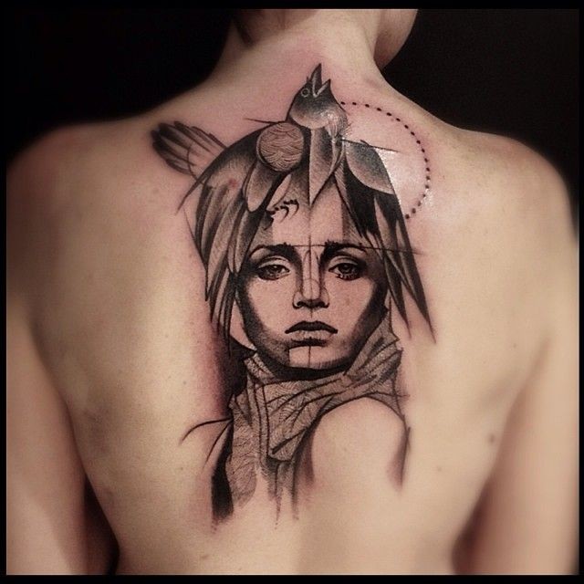 Sketch style black ink whole back tattoo of woman face with crow