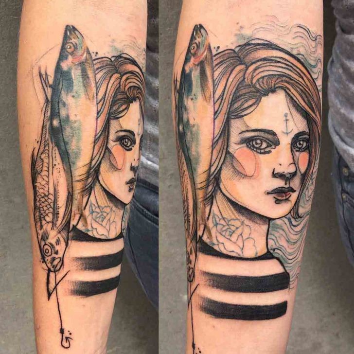 Sketch style colored forearm tattoo of sailor woman with fishes