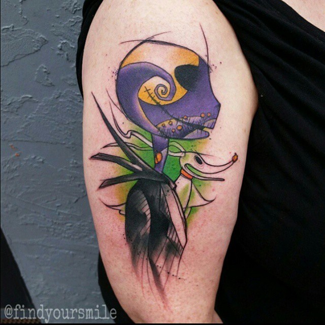 Sketch style colored shoulder tattoo fo Nightmare before Christmas cartoon heroes