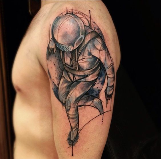 Sketch style colored shoulder tattoo of big Astronaut