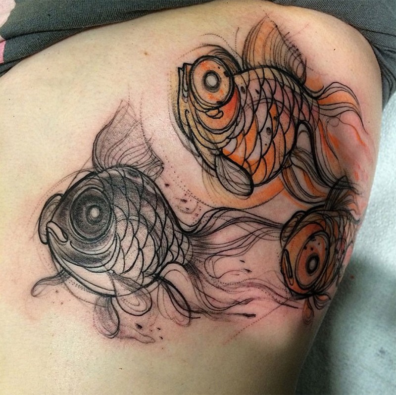 Sketch style colored tattoo of beautiful fishes