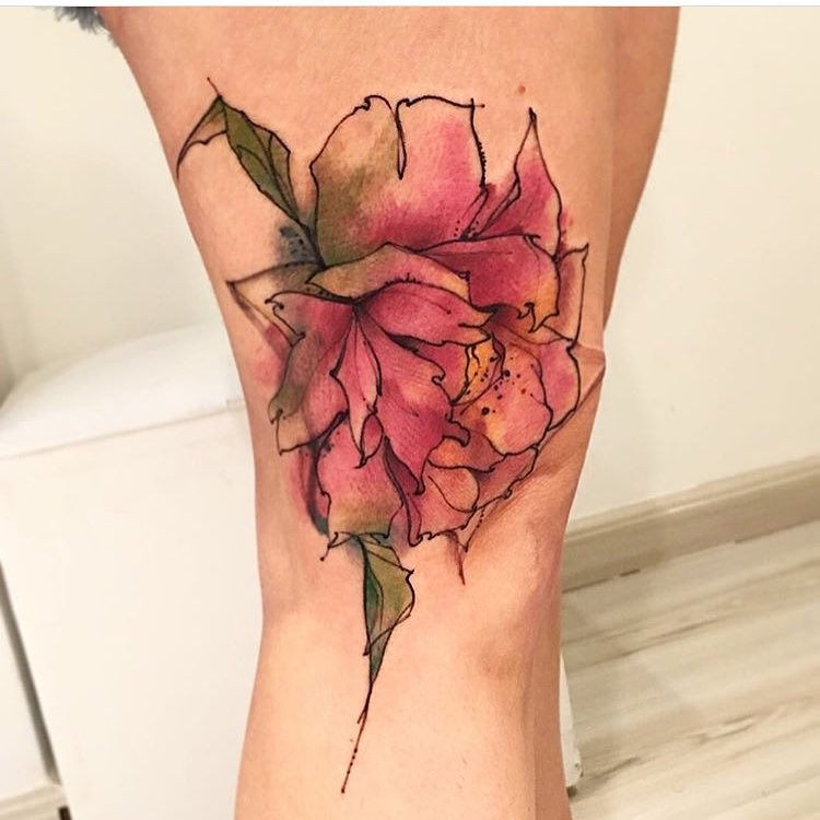Sketch style colored thigh tattoo of big flower