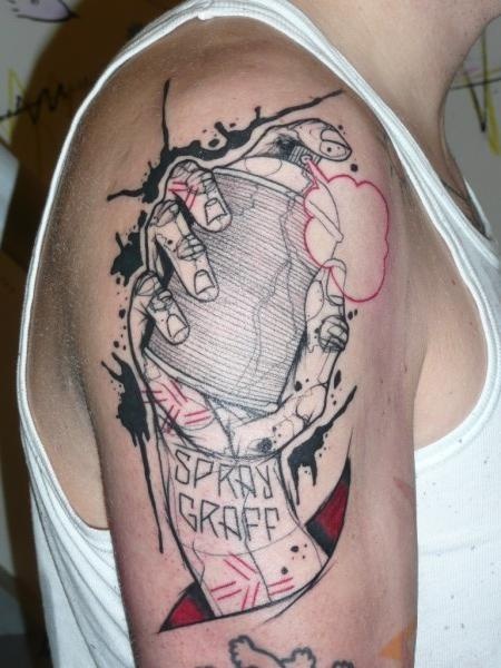 Sketch style colored upper arm tattoo of hand with spray paint and lettering