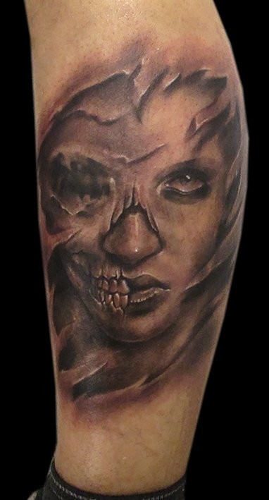 Skull face lady black ink tattoo