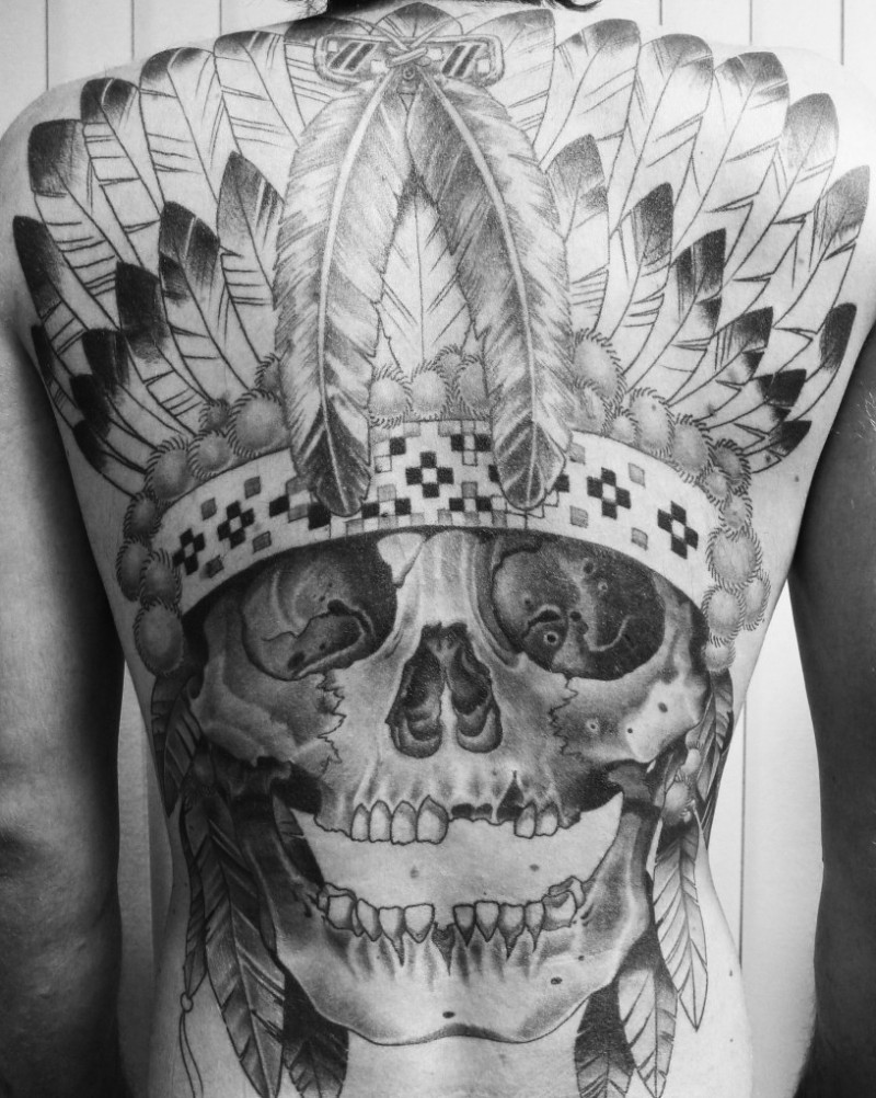 Skull in an indian headdress tattoo on whole back